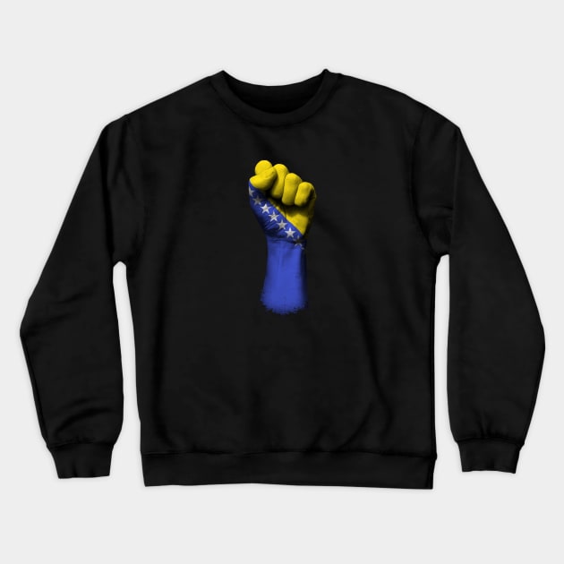 Flag of Bosnia and Herzegovina on a Raised Clenched Fist Crewneck Sweatshirt by jeffbartels